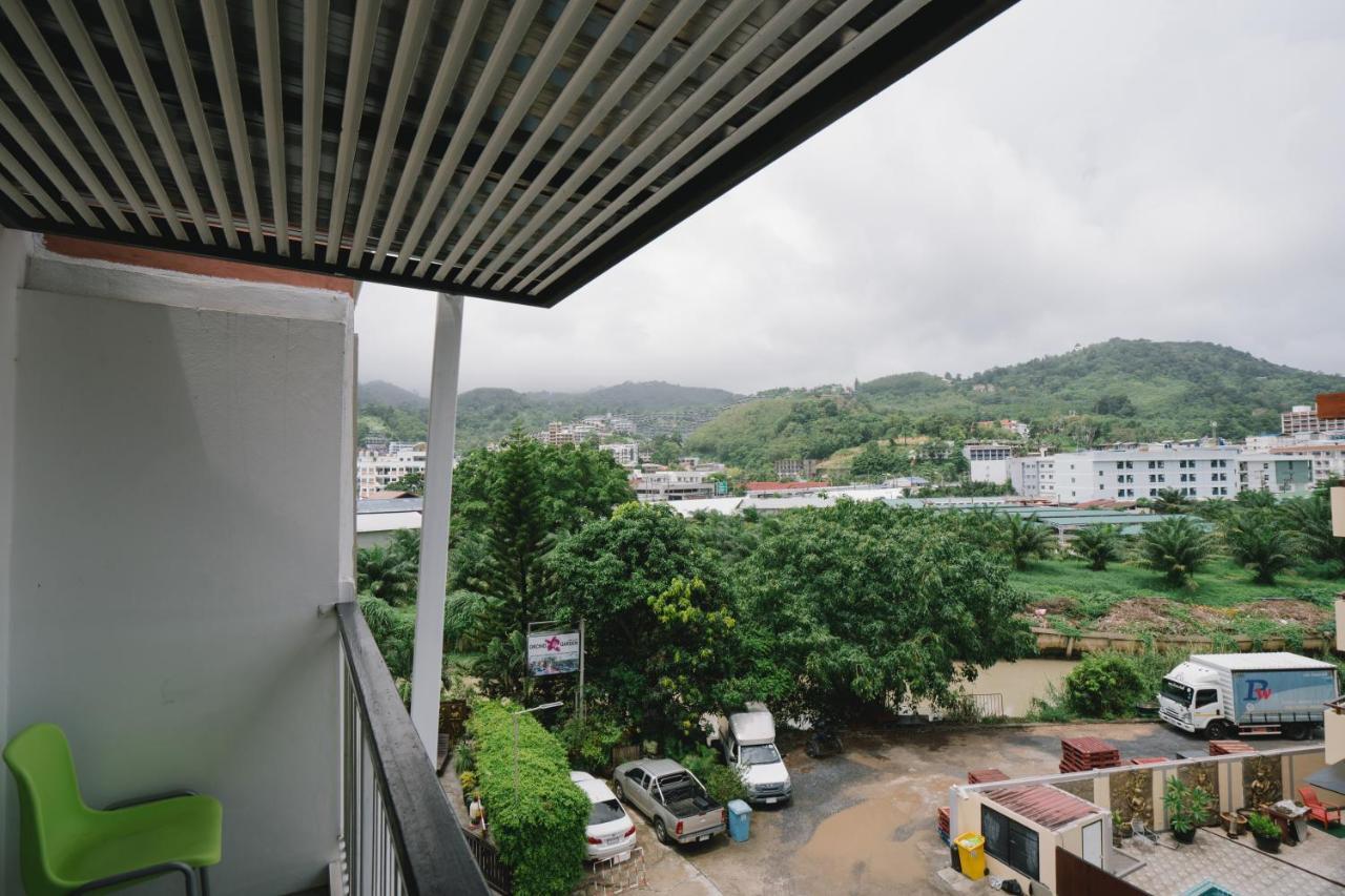 Noble House Patong Hotel Exterior foto