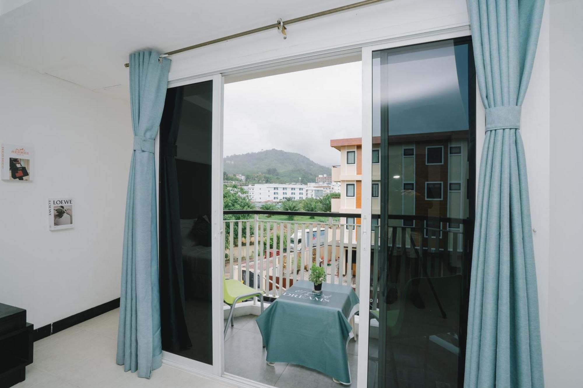 Noble House Patong Hotel Exterior foto